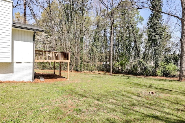 view of yard with a deck