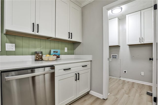 interior space with stainless steel dishwasher, light wood finished floors, crown molding, and baseboards