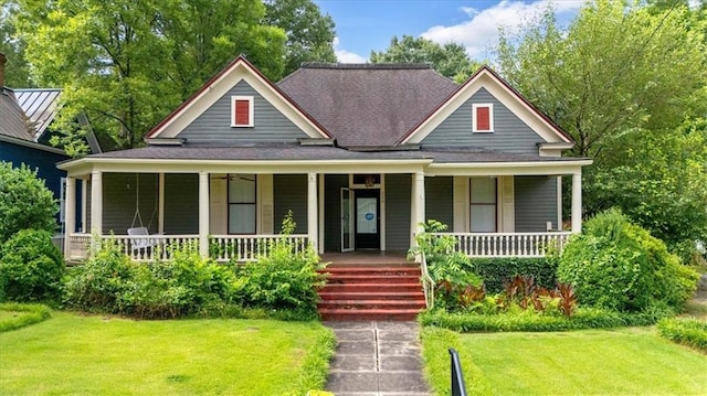 226 Noyes St, Cedartown, GA 30125 - view of front of property with a porch, a front lawn, and roof with shingles