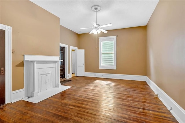 226 Noyes St, Cedartown, GA 30125 - unfurnished living room featuring a ceiling fan and wood-type flooring
