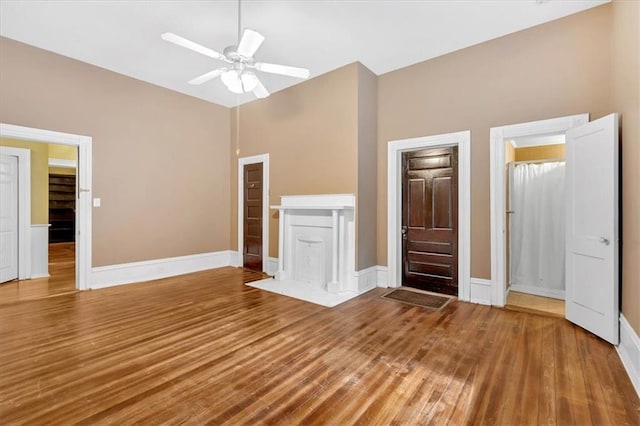 226 Noyes St, Cedartown, GA 30125 - unfurnished living room featuring wood finished floors and a ceiling fan