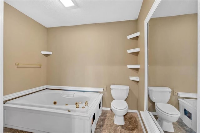 226 Noyes St, Cedartown, GA 30125 - bathroom featuring a tub with jets and a textured ceiling