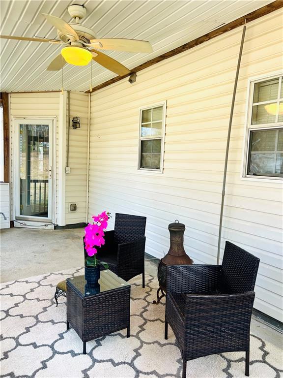view of patio / terrace featuring a ceiling fan