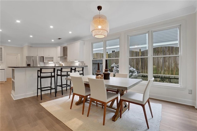 2255 Lenox Ridge Ct NE, Atlanta, GA 30319 - dining area with light wood-style floors, crown molding, recessed lighting, and baseboards