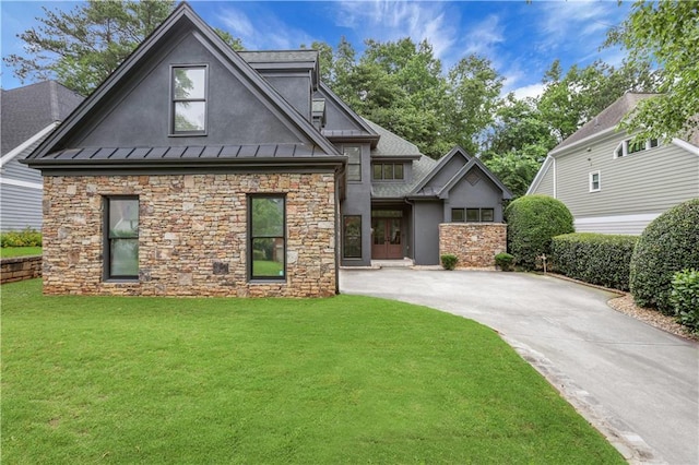 2255 Lenox Ridge Ct NE, Atlanta, GA 30319 - view of front of home featuring stone siding, stucco siding, a standing seam roof, a front yard, and metal roof