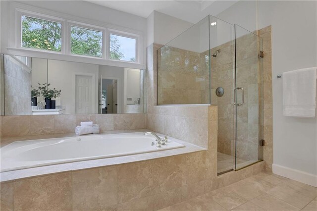 2255 Lenox Ridge Ct NE, Atlanta, GA 30319 - bathroom with a garden tub, a shower stall, tile patterned flooring, and baseboards
