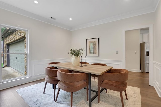 2255 Lenox Ridge Ct NE, Atlanta, GA 30319 - dining space with crown molding, wood finished floors, a wainscoted wall, recessed lighting, and a decorative wall