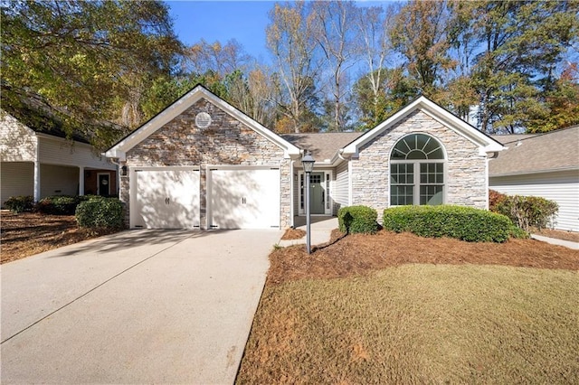 view of front of property featuring a garage