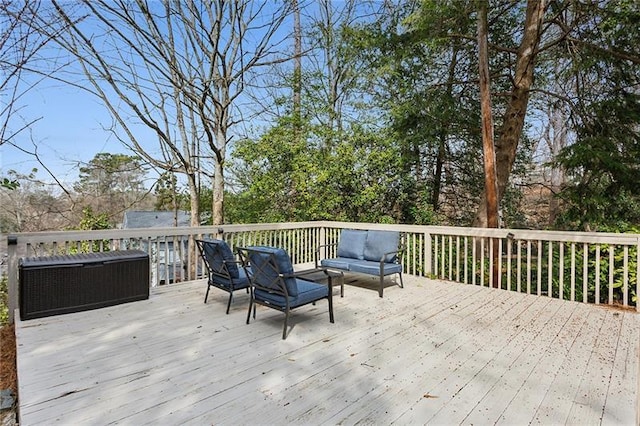 wooden deck featuring an outdoor living space