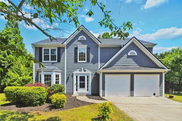 870 Underhill Ct, Sugar Hill, GA 30518 - view of front of property featuring concrete driveway, an attached garage, and roof with shingles