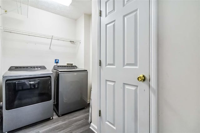 870 Underhill Ct, Sugar Hill, GA 30518 - laundry area featuring independent washer and dryer and wood finished floors
