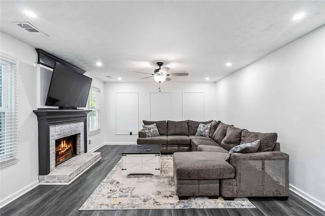 870 Underhill Ct, Sugar Hill, GA 30518 - living area with dark wood-type flooring, a ceiling fan, baseboards, a brick fireplace, and recessed lighting