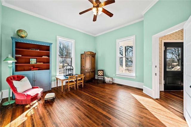 sitting room with crown molding, hardwood / wood-style flooring, a wealth of natural light, and ceiling fan