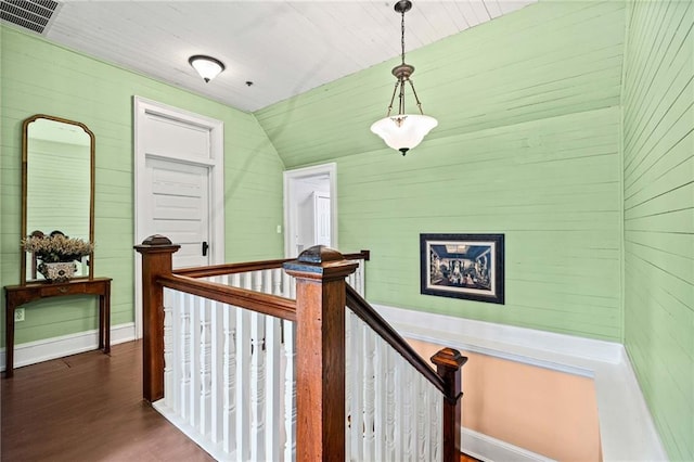 hall with hardwood / wood-style floors