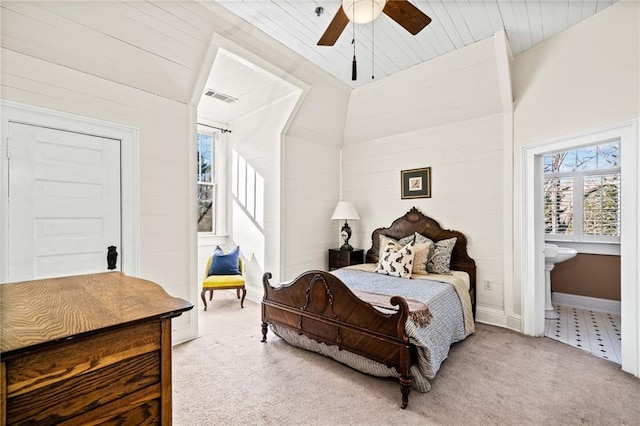 bedroom featuring lofted ceiling, carpet flooring, and wood ceiling