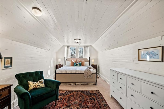 carpeted bedroom with wood ceiling and lofted ceiling