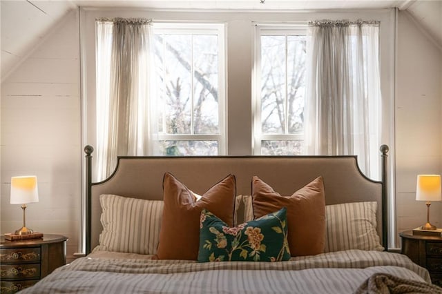 bedroom featuring vaulted ceiling