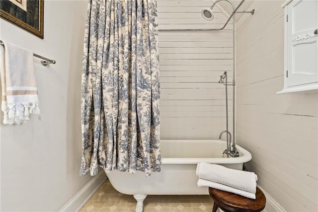 bathroom with tile patterned floors