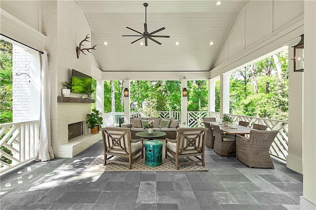 view of patio / terrace featuring ceiling fan and an outdoor living space