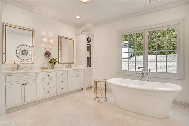 full bathroom with double vanity, a sink, recessed lighting, and a soaking tub