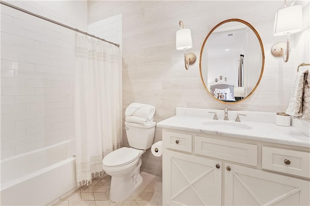 full bathroom with toilet, tile patterned floors, shower / bathtub combination with curtain, and vanity