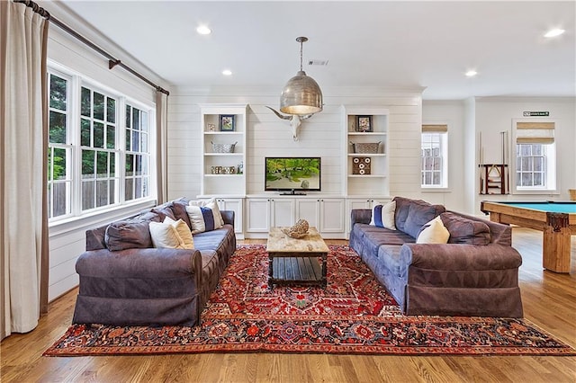 living room featuring pool table, ornamental molding, recessed lighting, and wood finished floors