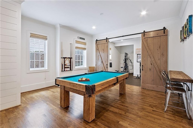 rec room with crown molding, a barn door, pool table, baseboards, and wood finished floors