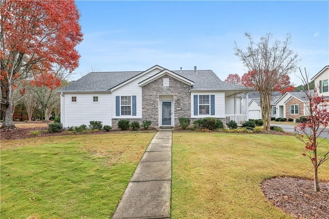 view of front of home with a porch and a front lawn