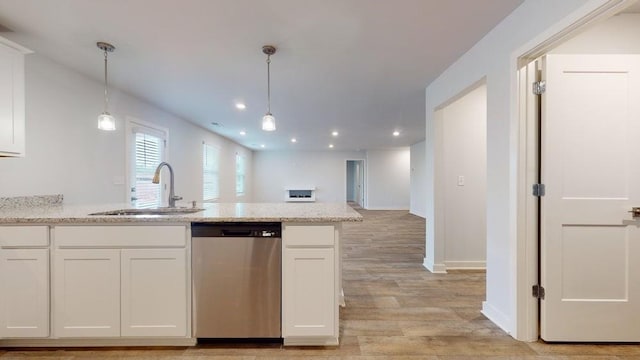 142 Post Oak Dr, Jackson, GA 30233 - kitchen with stainless steel dishwasher, a sink, light wood-type flooring, white cabinetry, and recessed lighting