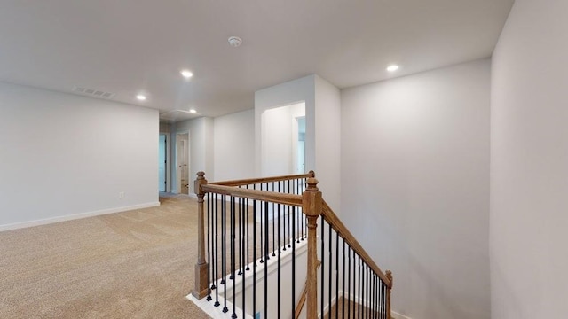 142 Post Oak Dr, Jackson, GA 30233 - hall with an upstairs landing, recessed lighting, baseboards, and light colored carpet