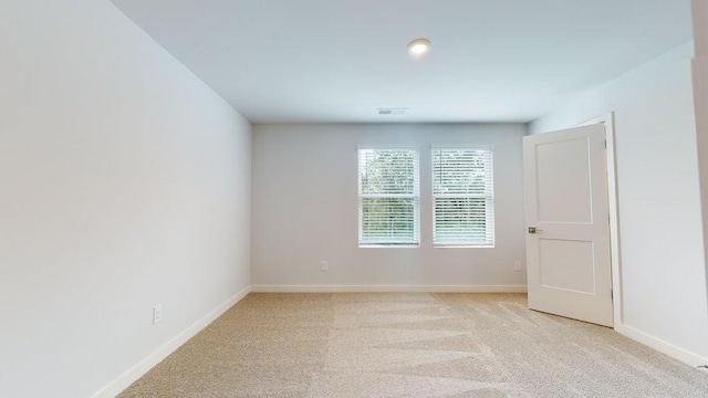 142 Post Oak Dr, Jackson, GA 30233 - spare room featuring light carpet and baseboards