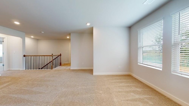 142 Post Oak Dr, Jackson, GA 30233 - unfurnished room featuring light carpet, plenty of natural light, recessed lighting, and baseboards