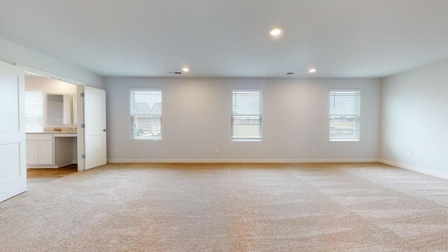 142 Post Oak Dr, Jackson, GA 30233 - unfurnished bedroom featuring light colored carpet, multiple windows, recessed lighting, and baseboards