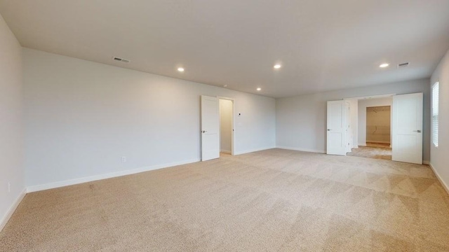 142 Post Oak Dr, Jackson, GA 30233 - spare room featuring light colored carpet, recessed lighting, and baseboards