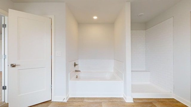 142 Post Oak Dr, Jackson, GA 30233 - full bathroom with a bath, recessed lighting, wood finished floors, baseboards, and a shower