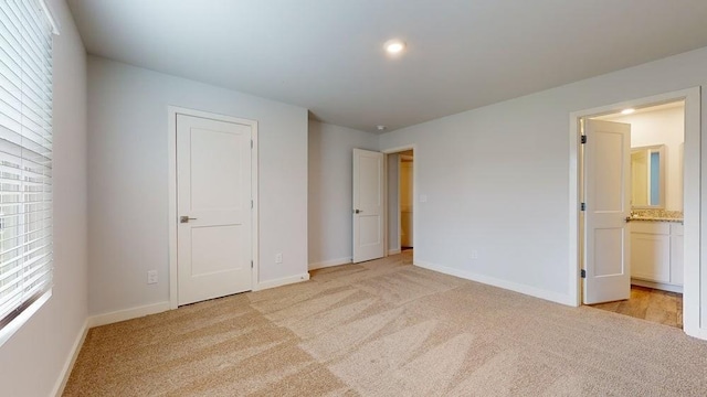 142 Post Oak Dr, Jackson, GA 30233 - unfurnished bedroom featuring light colored carpet, baseboards, ensuite bath, and recessed lighting