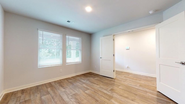142 Post Oak Dr, Jackson, GA 30233 - unfurnished bedroom featuring light wood-type flooring and baseboards