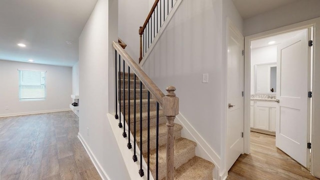 142 Post Oak Dr, Jackson, GA 30233 - stairway featuring wood finished floors, recessed lighting, and baseboards