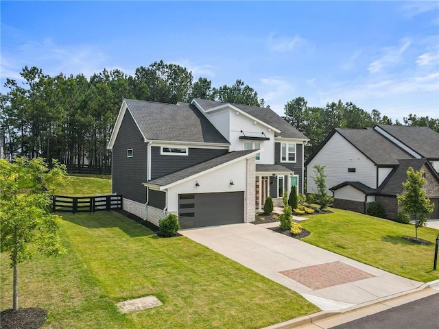 7985 Welch Ml, Ball Ground, GA 30107 - view of front of property with concrete driveway, a shingled roof, a garage, brick siding, and stucco siding