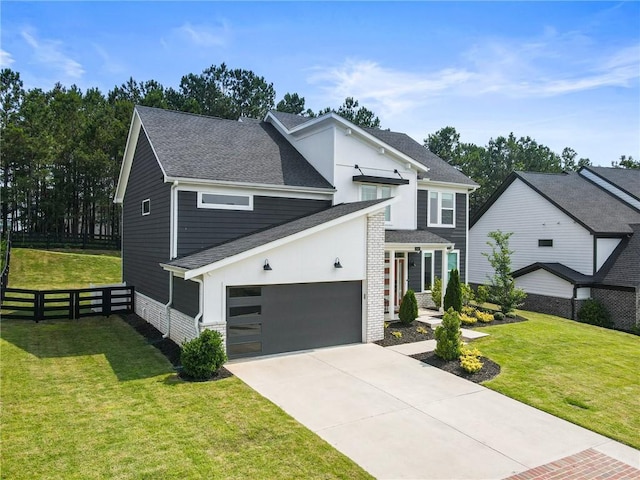 7985 Welch Ml, Ball Ground, GA 30107 - view of front of house with roof with shingles, driveway, a garage, and brick siding