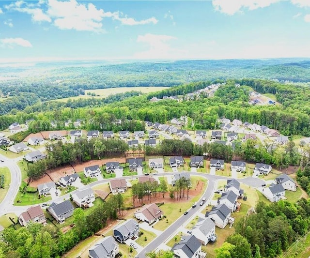 7985 Welch Ml, Ball Ground, GA 30107 - aerial overview of property's location featuring nearby suburban area and a heavily wooded area