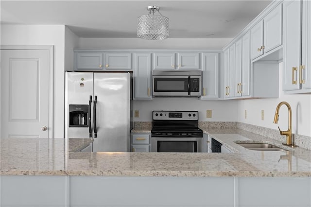 1102 Madison Ln SE Unit 1102, Smyrna, GA 30080 - kitchen with stainless steel appliances and light stone counters