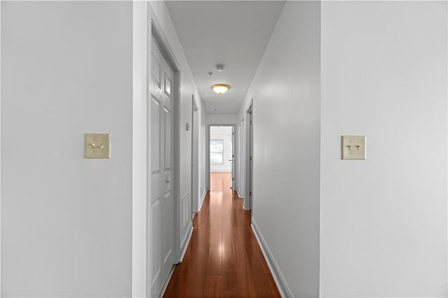1102 Madison Ln SE Unit 1102, Smyrna, GA 30080 - hallway featuring dark wood-type flooring and baseboards