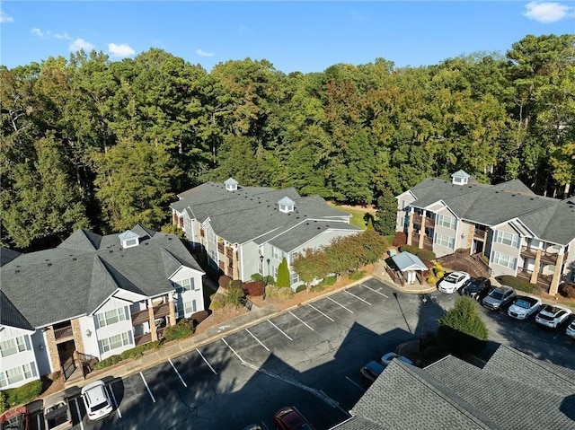 1102 Madison Ln SE Unit 1102, Smyrna, GA 30080 - aerial perspective of suburban area with a heavily wooded area