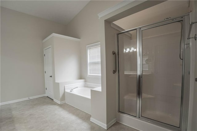 bathroom featuring independent shower and bath