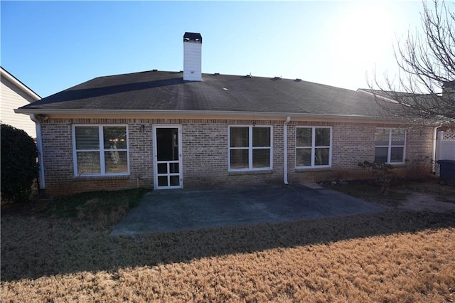 rear view of house featuring a patio area