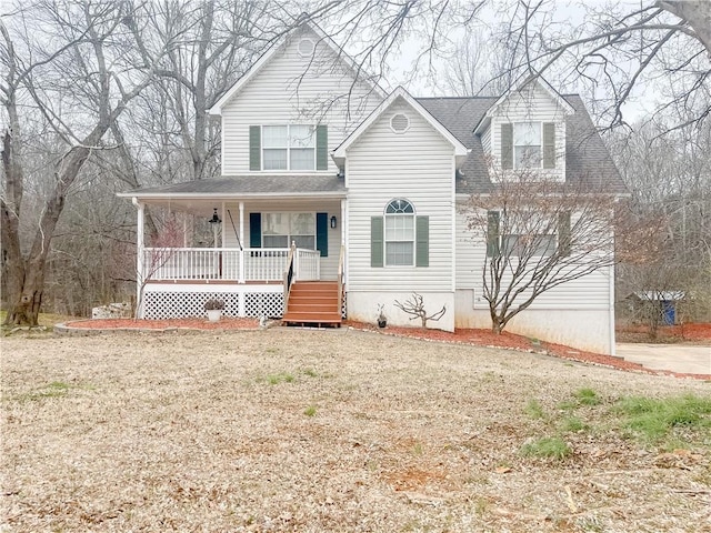 view of front of house featuring a porch and a front yard