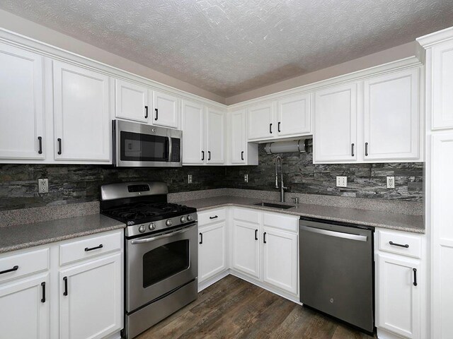 bathroom featuring crown molding, vanity, toilet, and a tile shower