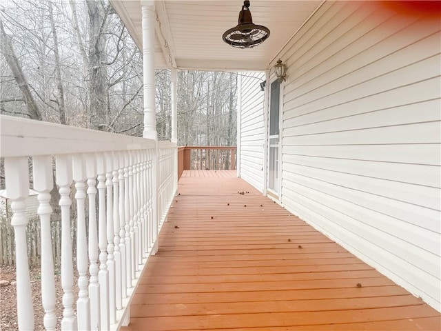 wooden terrace with ceiling fan