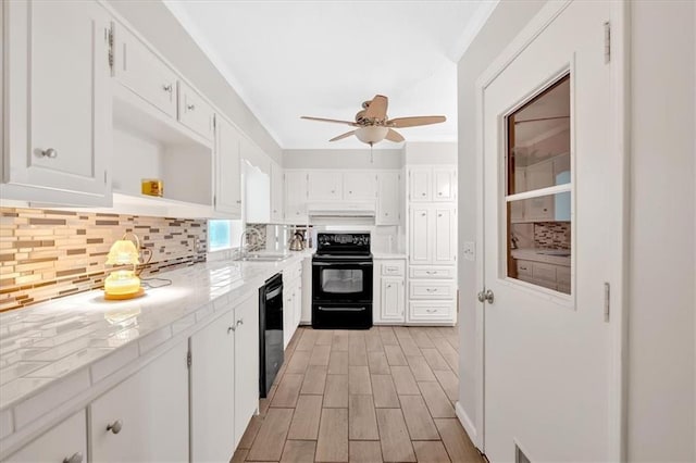 kitchen featuring black appliances, decorative backsplash, white cabinetry, open shelves, and ceiling fan
